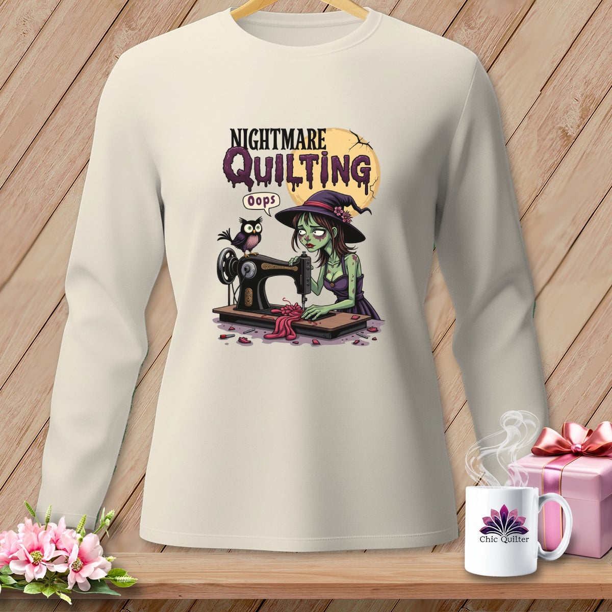 Long-sleeve shirt with "Nightmare Quilting" graphic of a zombie witch at a sewing machine.