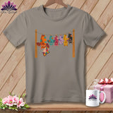 T-shirt with colorful bats hanging from a clothesline.