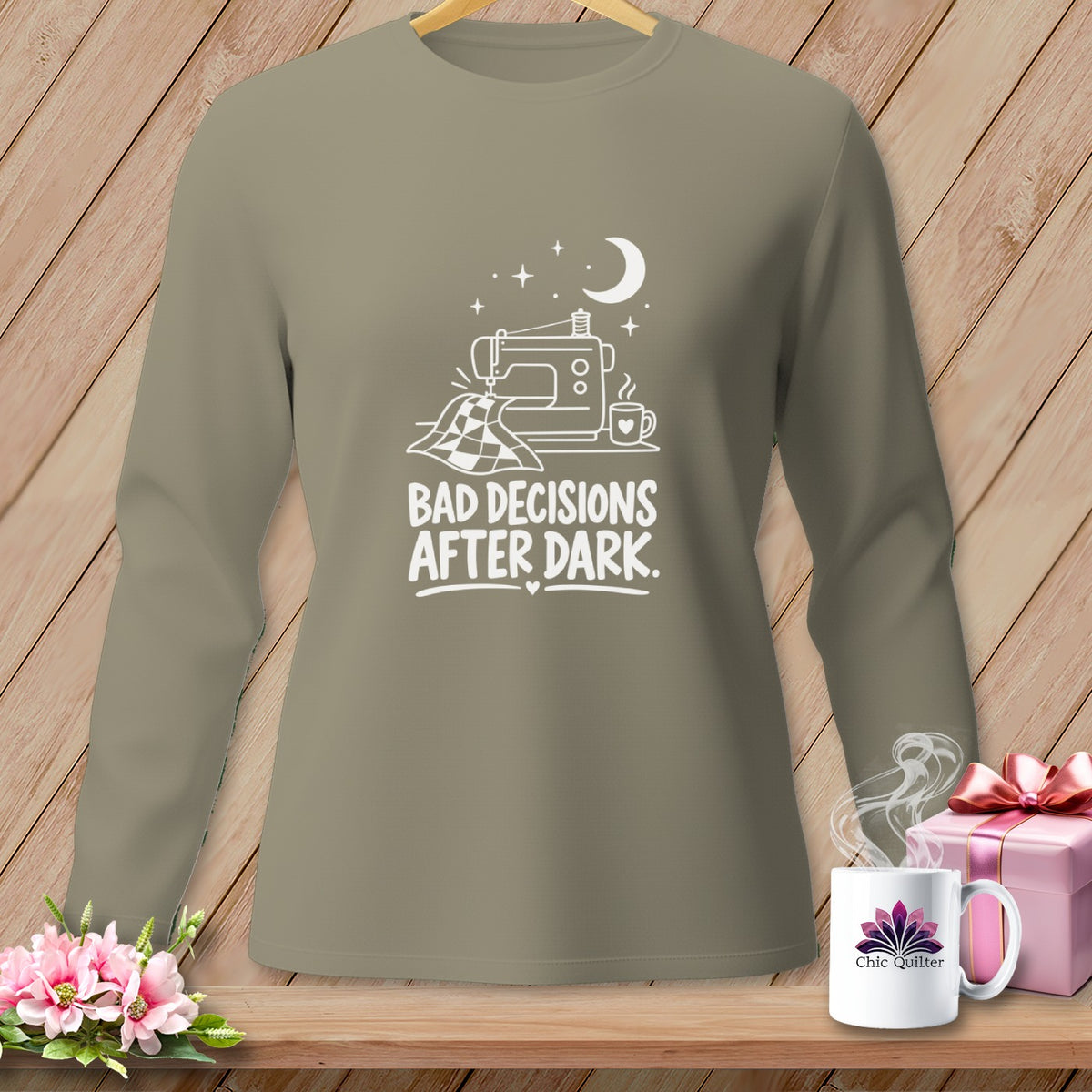 Long sleeve shirt with sewing machine, moon, stars, and "Bad Decisions After Dark" text.