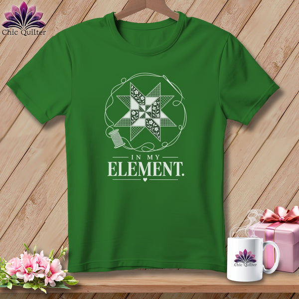 Green t-shirt with a quilt block design and "In My Element" text.