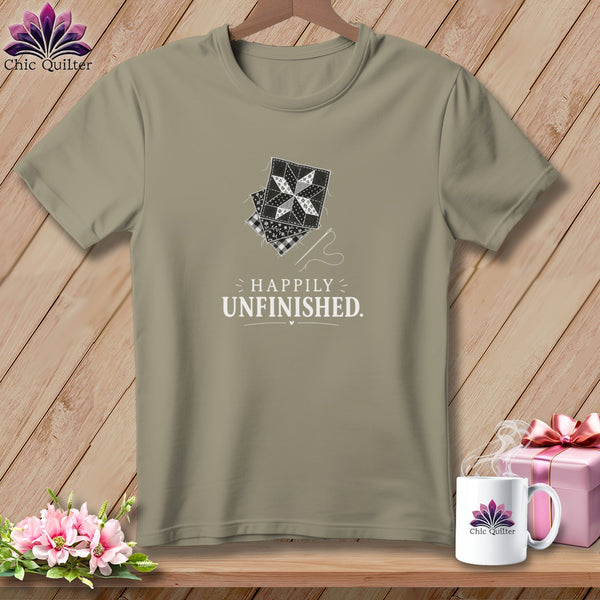 T-shirt with patchwork quilt design and "Happily Unfinished" text.