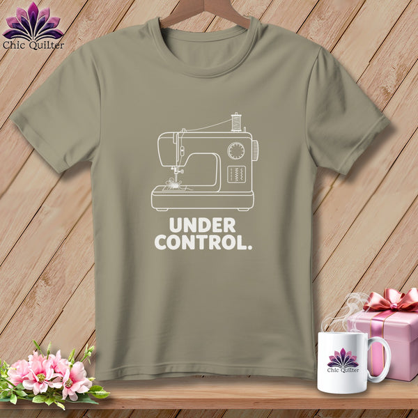 T-shirt with white sewing machine graphic and text "UNDER CONTROL.".