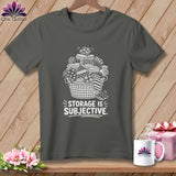 Dark gray t-shirt with a white graphic of a basket overflowing with fabric and text.