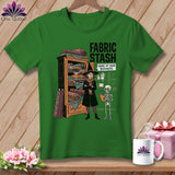 Green t-shirt graphic with witch, skeleton, and fabric stash saying 