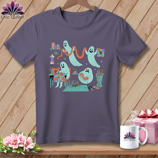 T-shirt with ghosts sewing and quilting, on a wooden background with a gift box.