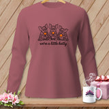 Rose long-sleeved shirt with three cartoon bats and the text 