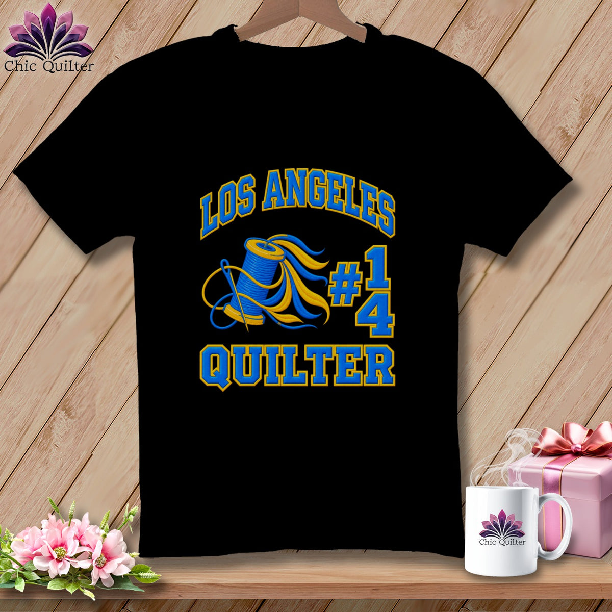 Black t-shirt featuring a Los Angeles Quilter graphic with a spool of thread and number fourteen.