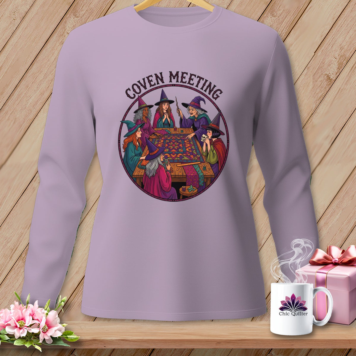 Witches gathered around a table with quilting supplies, with text "Coven Meeting" above.