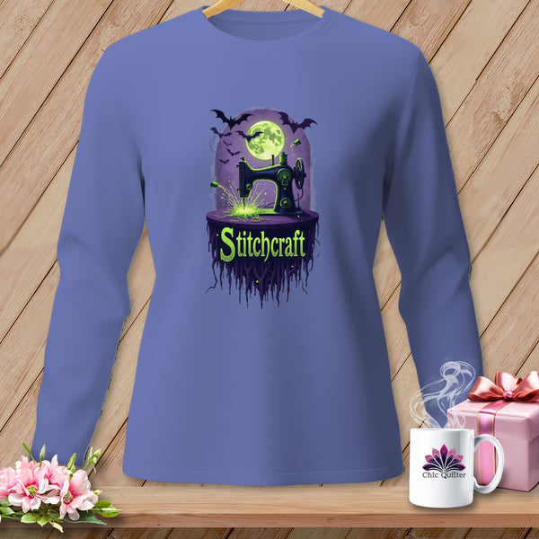 Long sleeve shirt with a sewing machine, bats, and moon graphic that reads "Stitchcraft".