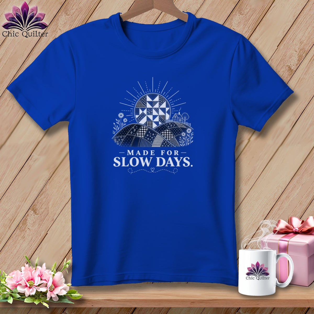 Royal blue t-shirt with a sun design and text "MADE FOR SLOW DAYS."
