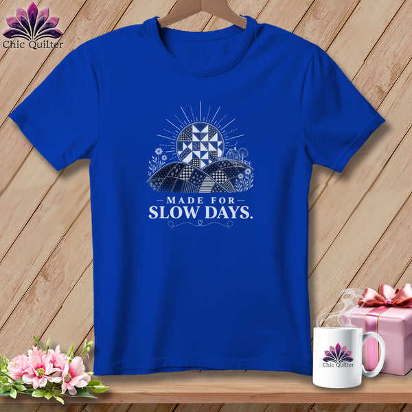 Royal blue t-shirt with a sun design and text "MADE FOR SLOW DAYS."