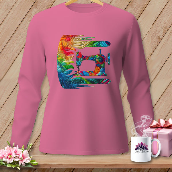 Pink long-sleeve shirt with a colorful sewing machine design and "Chic Quilter" logo.