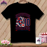 A black t-shirt features a red, white, and blue graphic that reads Houston Quilter with a stack of quilts and a coffee mug.