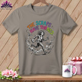 T-shirt with graphic of a person running from bats with text 