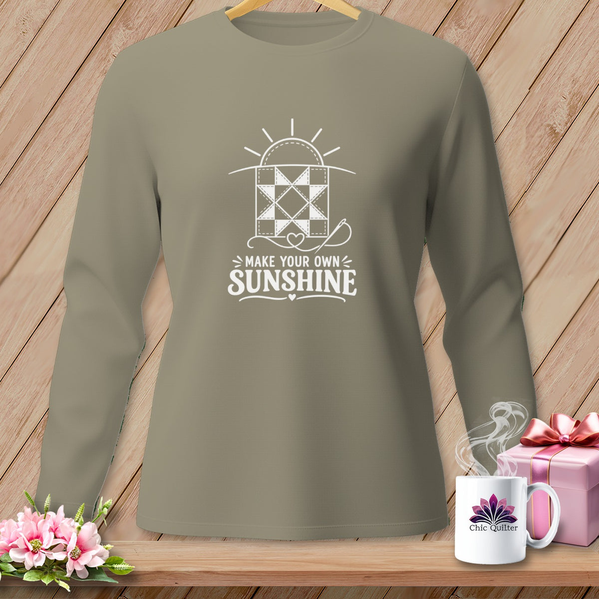Long-sleeve shirt with "Make Your Own Sunshine" and quilt graphic.