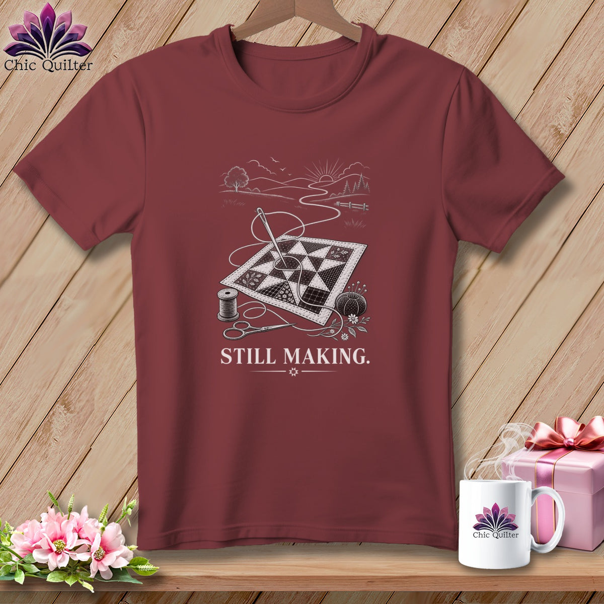 Maroon t-shirt with a quilting graphic and "STILL MAKING." text.