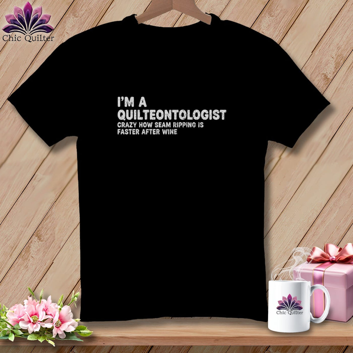Black t-shirt with "I'm a Quilteontologist" graphic.