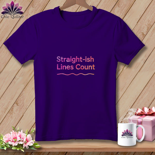 Purple t-shirt with "Straight-ish Lines Count" text, mug, gift box, and flowers.
