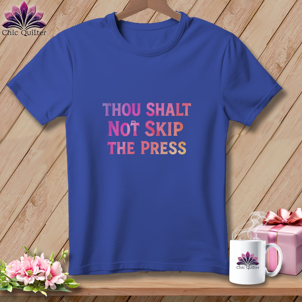 Royal blue t-shirt with gradient text "THOU SHALT NOT SKIP THE PRESS".