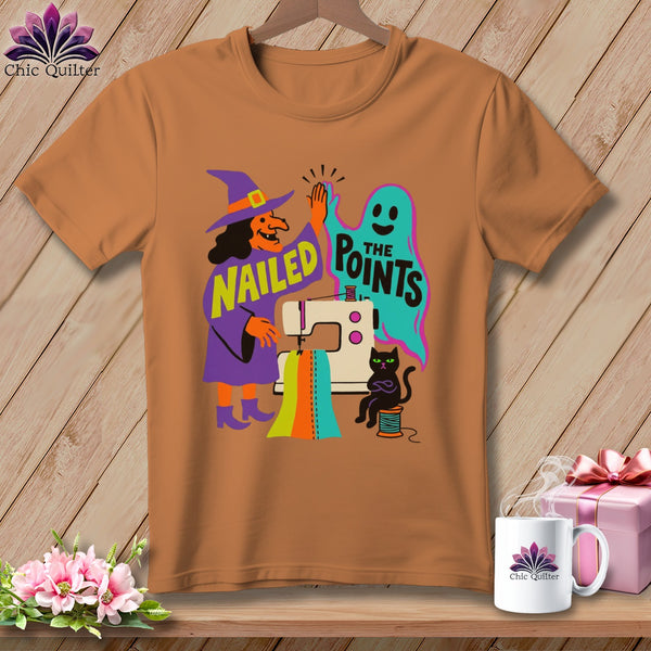 T-shirt with witch, ghost, and black cat sewing, reading "Nailed the Points".