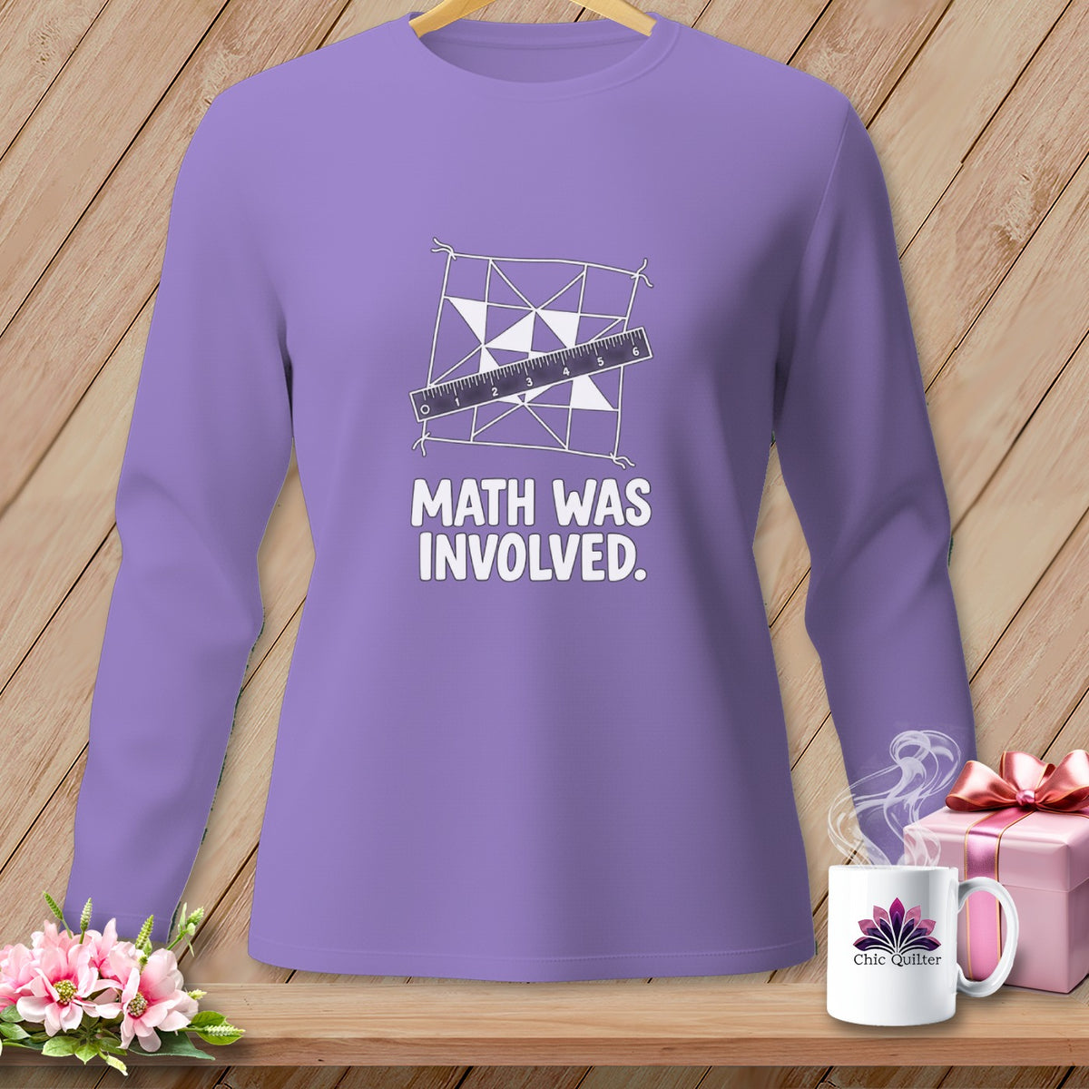 Purple long-sleeved shirt with "MATH WAS INVOLVED." text and geometric design.