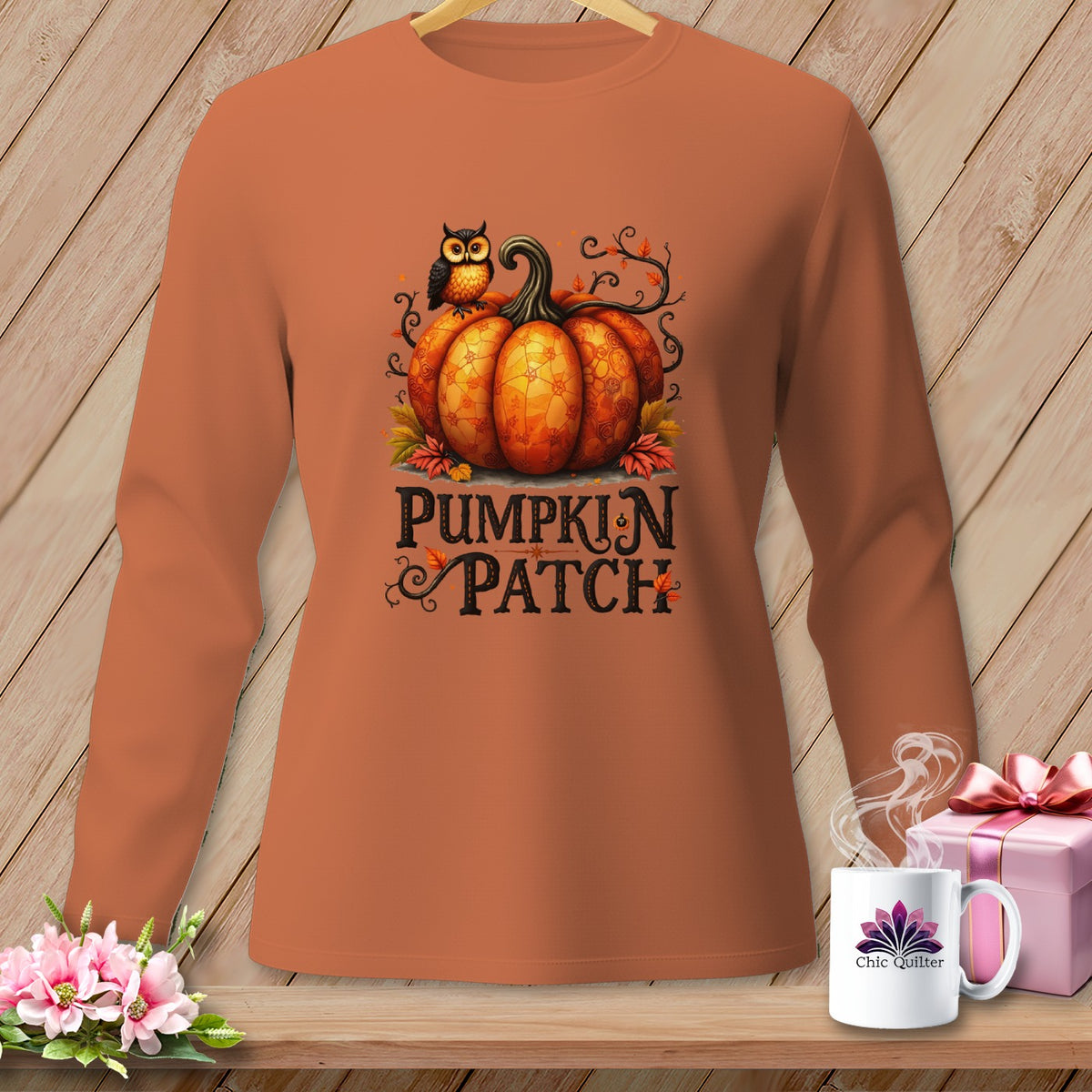Long-sleeve shirt with a graphic of a pumpkin, owl, and the text "Pumpkin Patch."