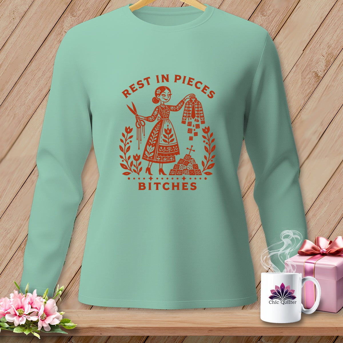 Mint long-sleeve shirt with "Rest in Pieces Bitches" graphic.