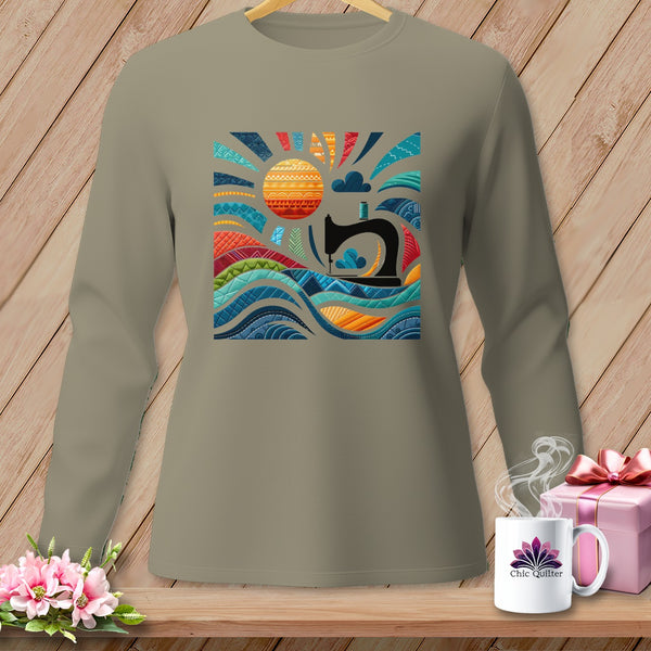 Gray long-sleeve shirt with a colorful sun, waves, and sewing machine graphic.