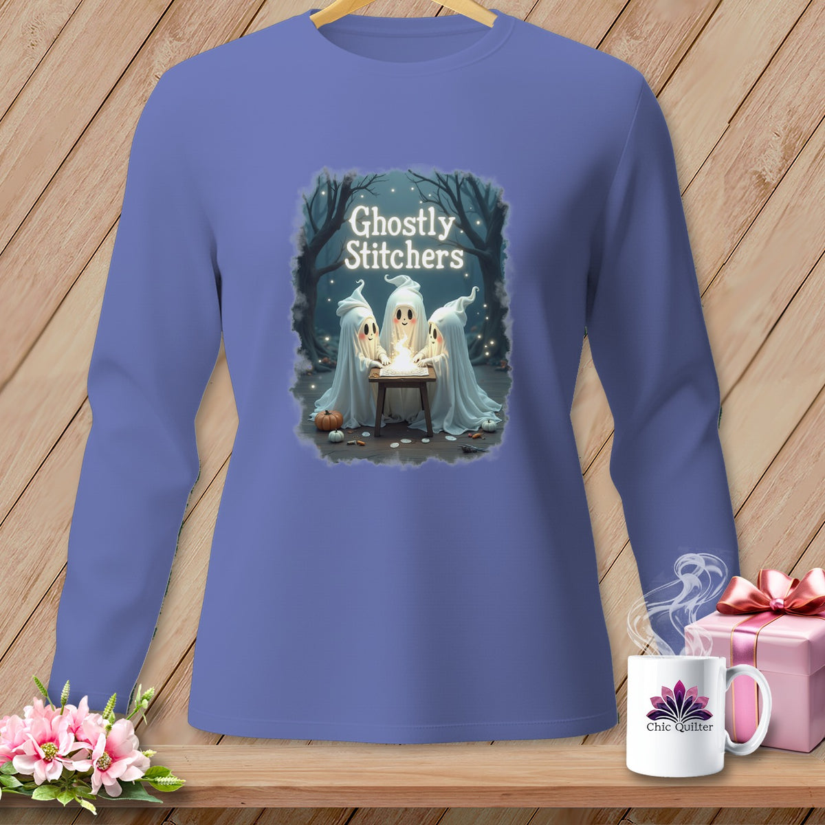 Long-sleeved shirt with "Ghostly Stitchers" graphic of three ghosts at a table.