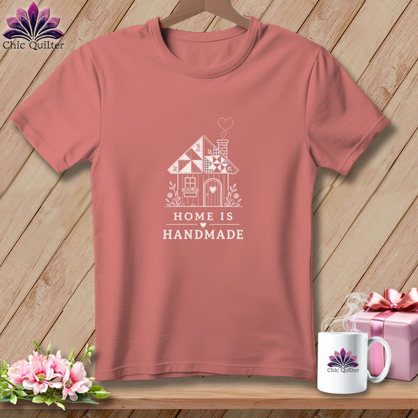 Coral t-shirt with white graphic of house and text "HOME IS HANDMADE".