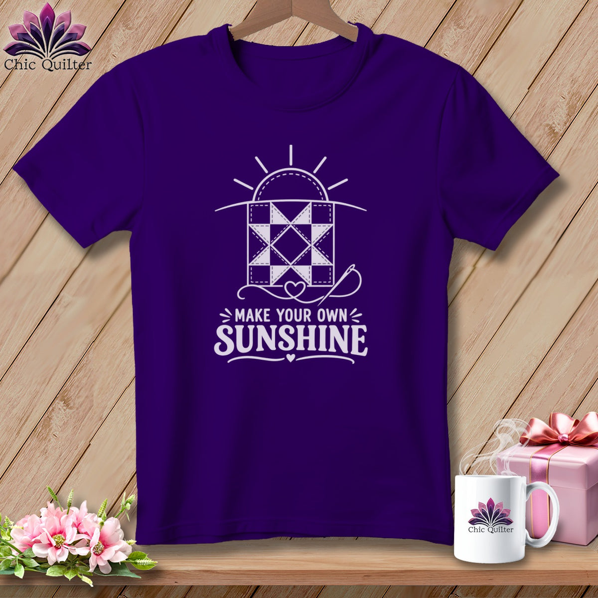 Purple t-shirt with white quilt design and text "Make Your Own Sunshine".