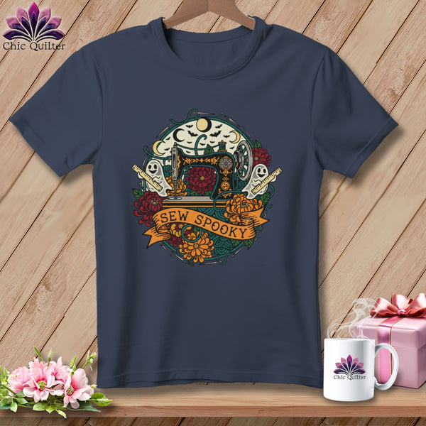 Dark blue t-shirt with "SEW SPOOKY" text and vintage sewing machine Halloween graphic.