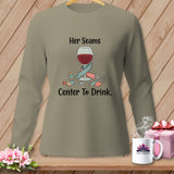 Long sleeve shirt with a wine glass surrounded by sewing notions and text.