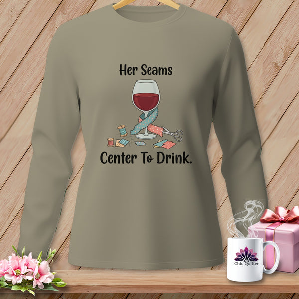 Long sleeve shirt with a wine glass surrounded by sewing notions and text.