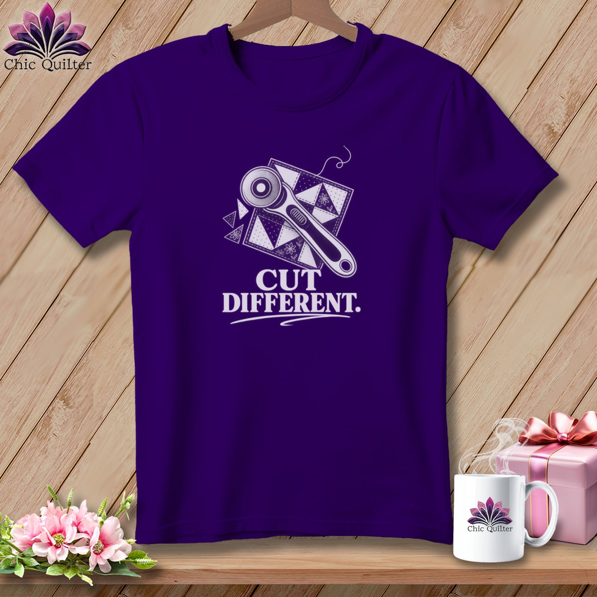 Purple t-shirt with rotary cutter, quilt squares, and "Cut Different." text.