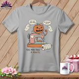 Jack-o'-lantern using sewing machine with ghosts. 