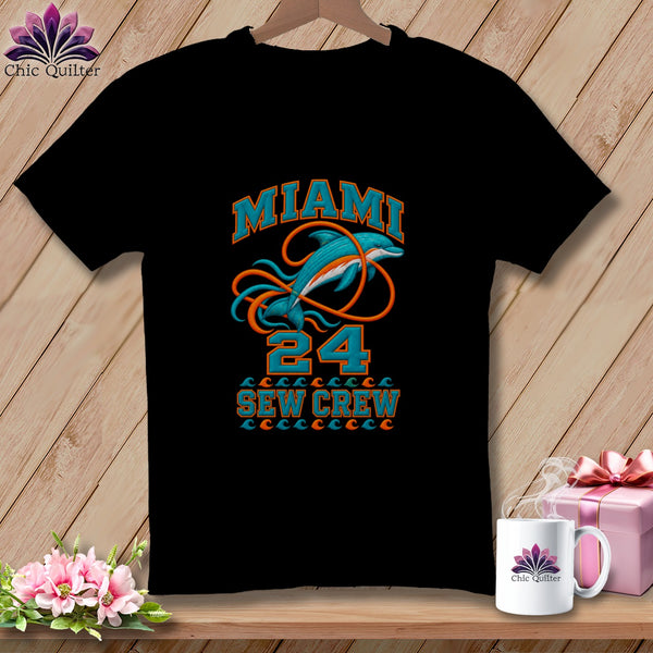 Black t-shirt featuring a Miami Sew Crew graphic with a dolphin and the number 24.