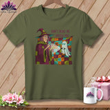 Green t-shirt with witch and ghost graphic and text 