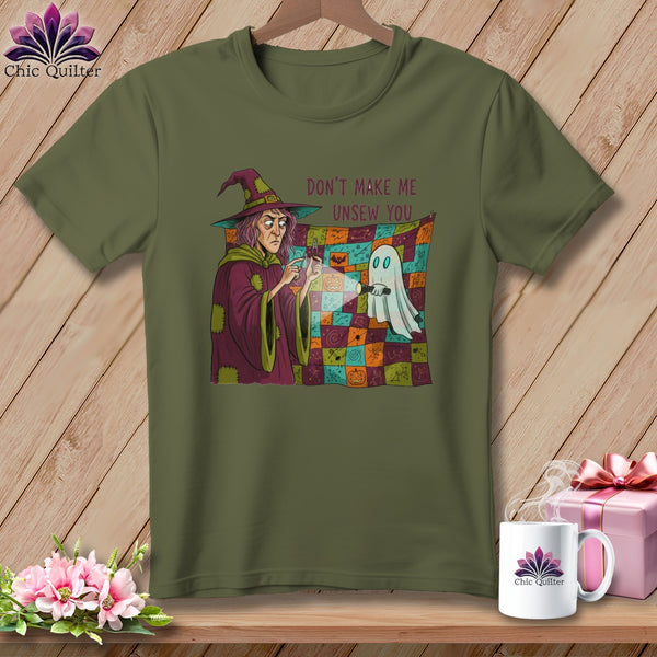 Green t-shirt with witch and ghost graphic and text "Don't Make Me Unsew You".