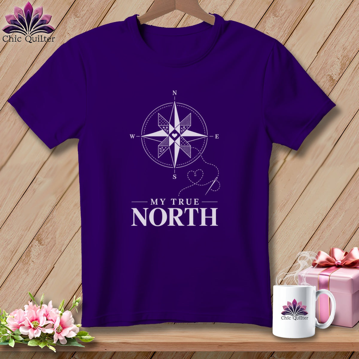Purple t-shirt with compass graphic and "My True North" text.