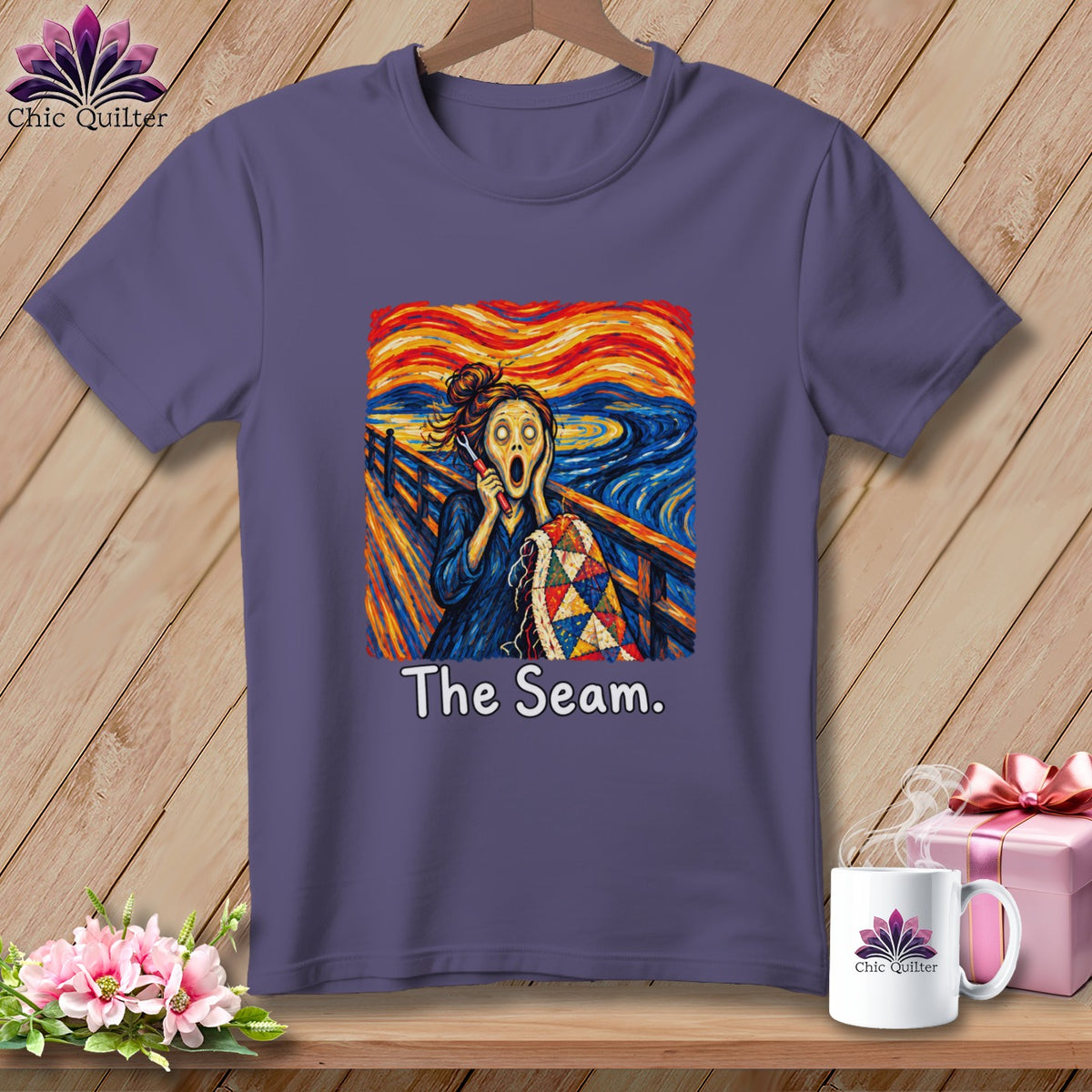 Purple t-shirt featuring "The Scream" artwork with a quilter and the text "The Seam."