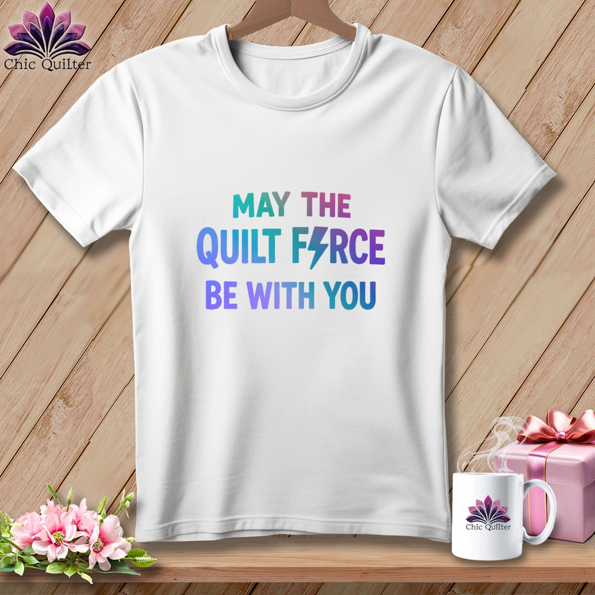 White t-shirt with "MAY THE QUILT FORCE BE WITH YOU" text and a lightning bolt.