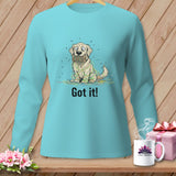 Teal long-sleeve shirt with a cartoon dog tangled in colorful yarn, text 