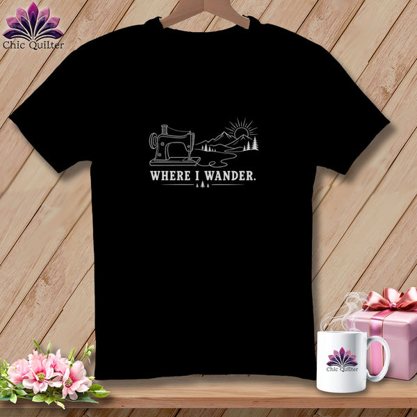 Black t-shirt with sewing machine, mountains, and "WHERE I WANDER." text.