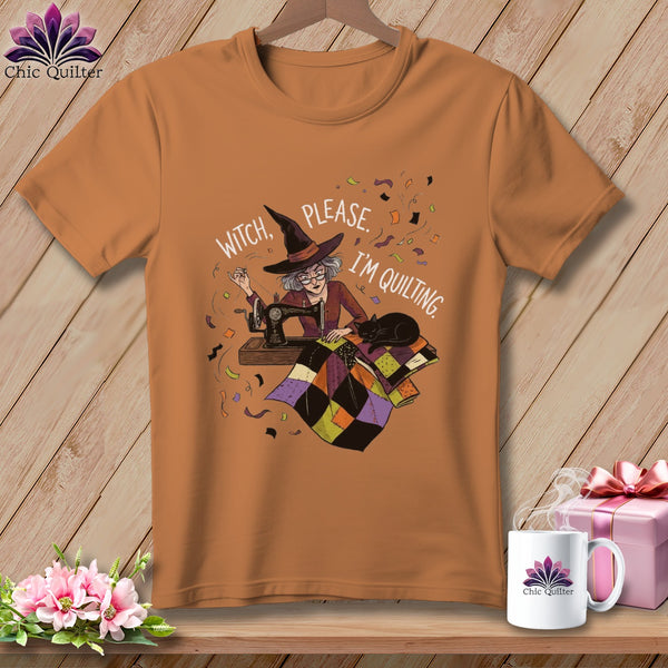 Witch, please. I'm quilting graphic on an orange t-shirt with a sewing machine and quilt.