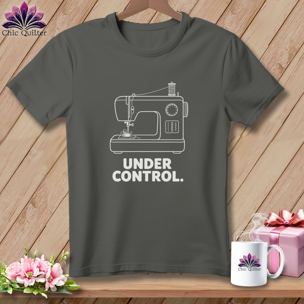 Grey t-shirt with white sewing machine graphic and text "UNDER CONTROL."