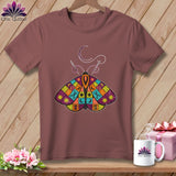 Brown t-shirt with colorful patchwork moth graphic, crescent moon, and sewing needle.
