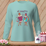 Light blue long-sleeve shirt with graphic of two women and 
