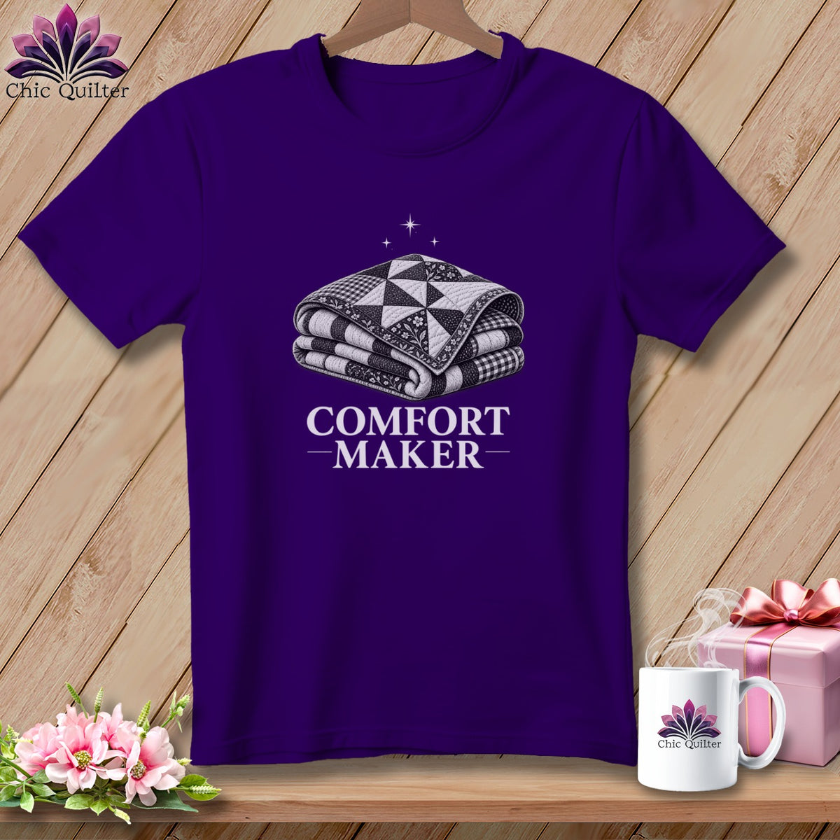 Purple t-shirt with folded quilt graphic and "COMFORT MAKER" text.