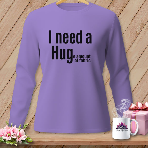 Purple long-sleeve shirt with "I need a Hug the amount of fabric" text.